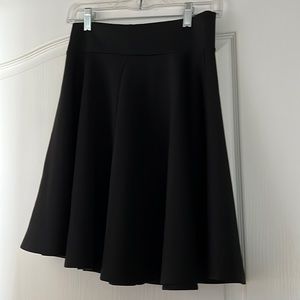 Swing skirt by Johnny 21 inches measures from waist to hem